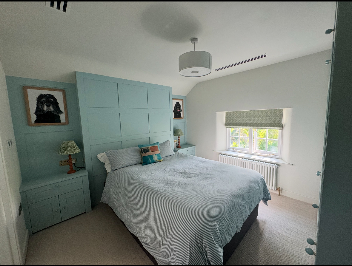 Discreet slim-line air conditioning ducted into a period bedroom by Evans & Son